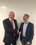 Andrew Bray, Australian Wind Alliance being congratulated by Executive Officer, Greg Lamont